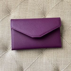 Purple wallet, well organized: credit cards, cash, & zipper compartment
